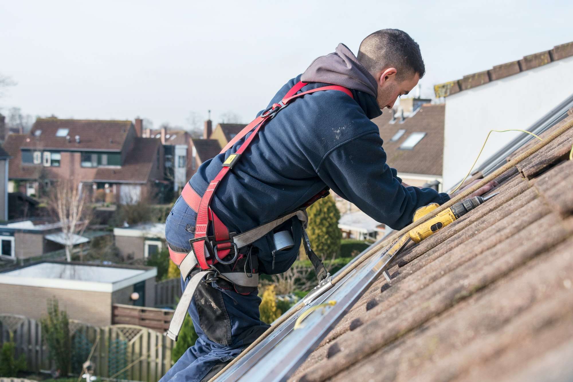 man making the construction for the solar panels